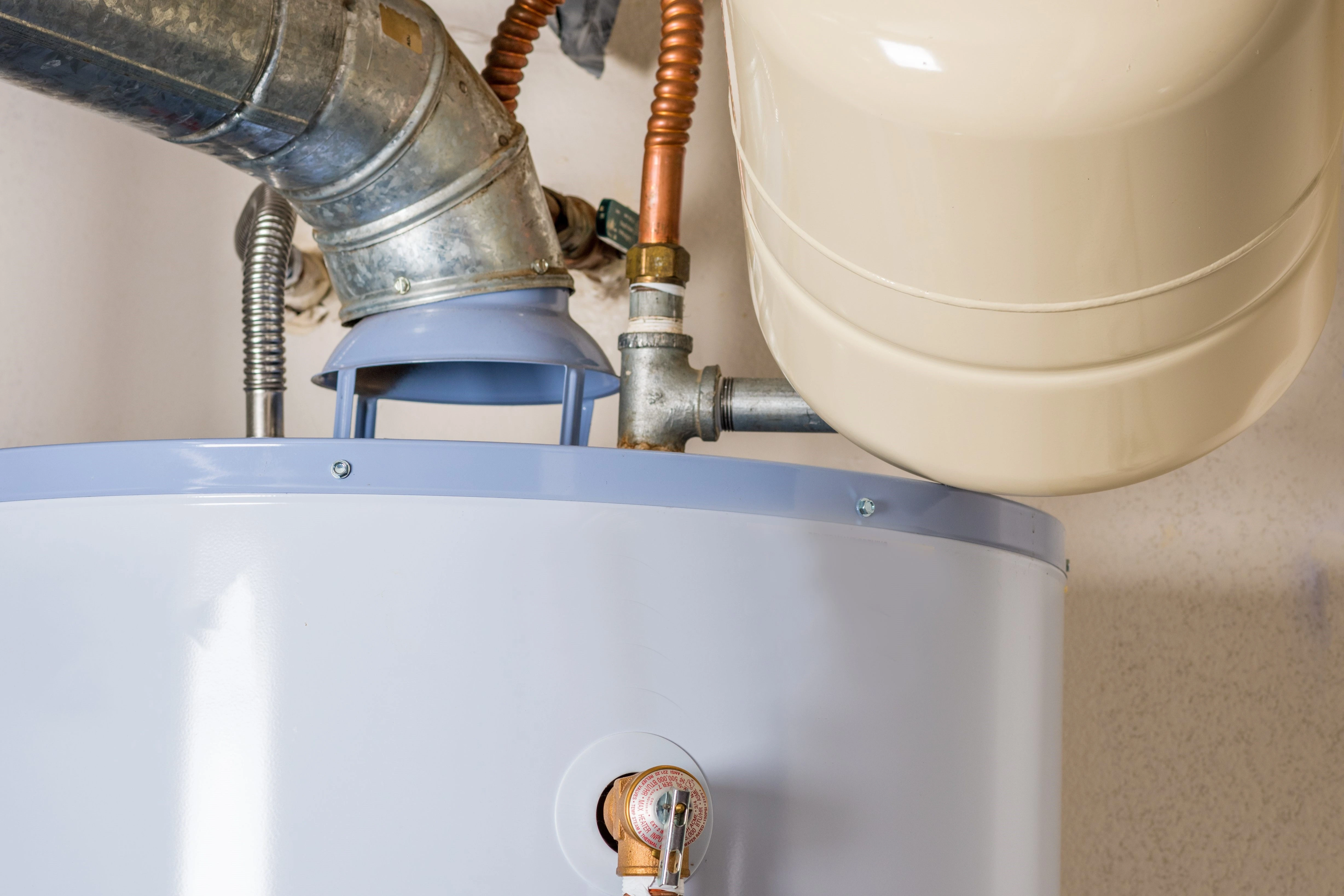 A traditional boiler system in a Tulsa home requiring professional repair service.