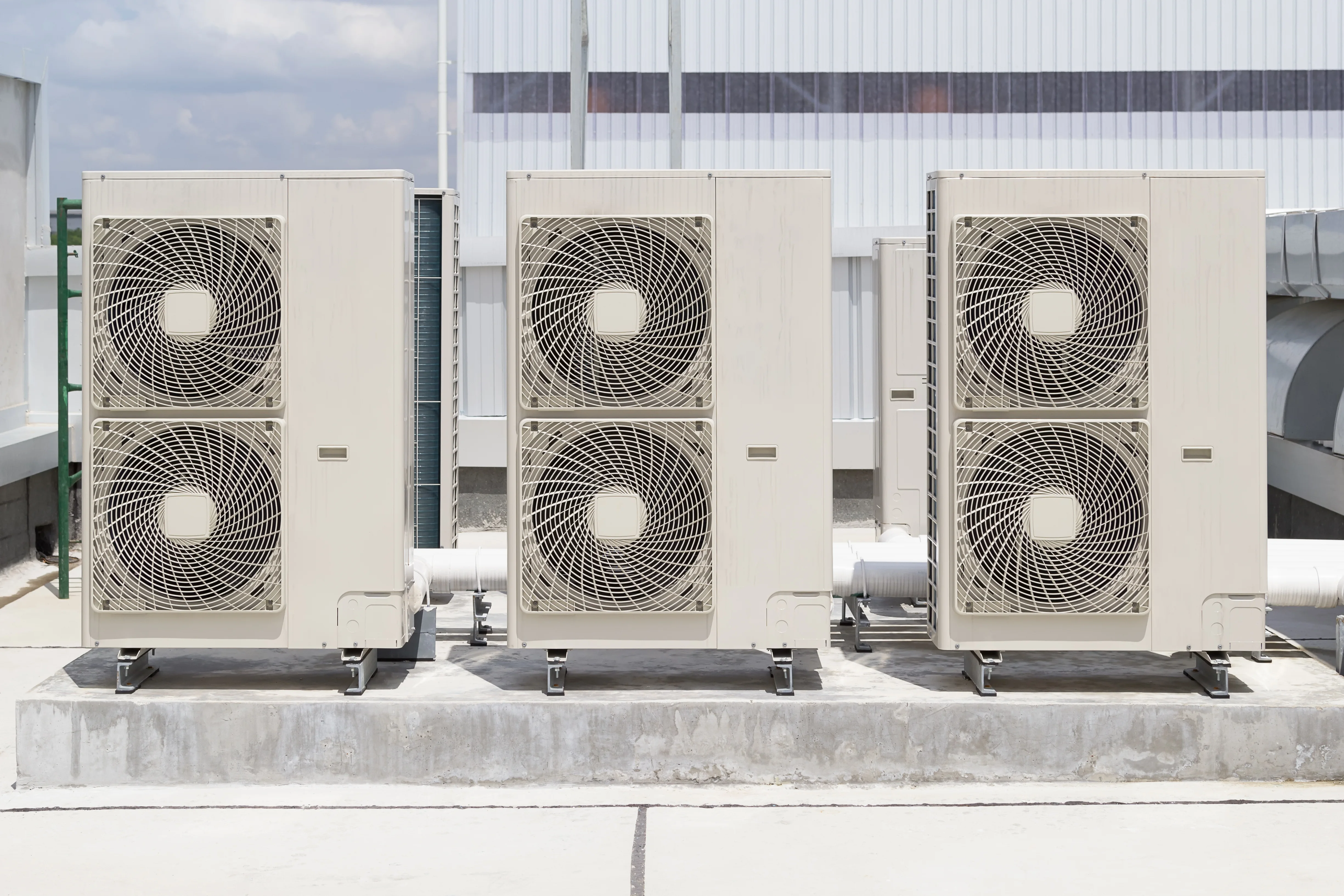 Rooftop commercial HVAC units in Tulsa requiring professional repair services.